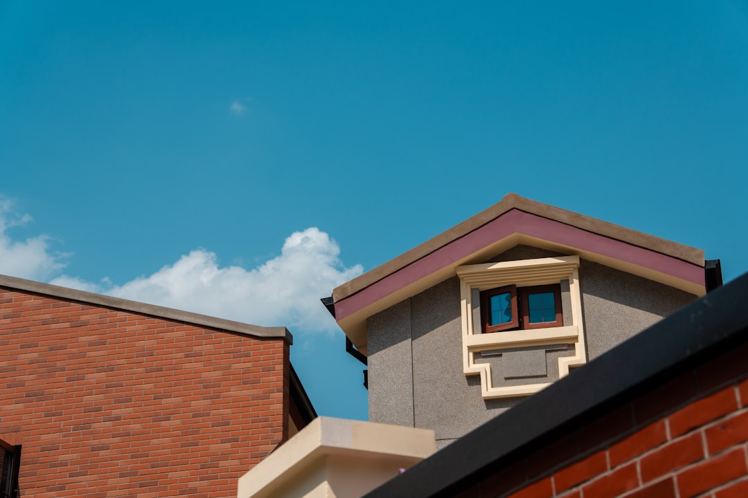 roofs-and-sky-with-scattered-clouds-zqpmhxquaq4